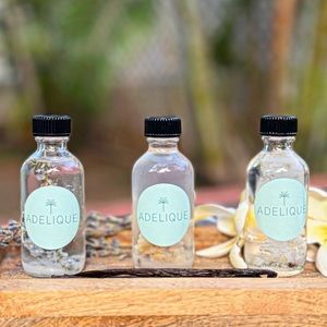 Trip of organic body oil made in Hawaii. Tahitian vanilla, lavender, plumeria.